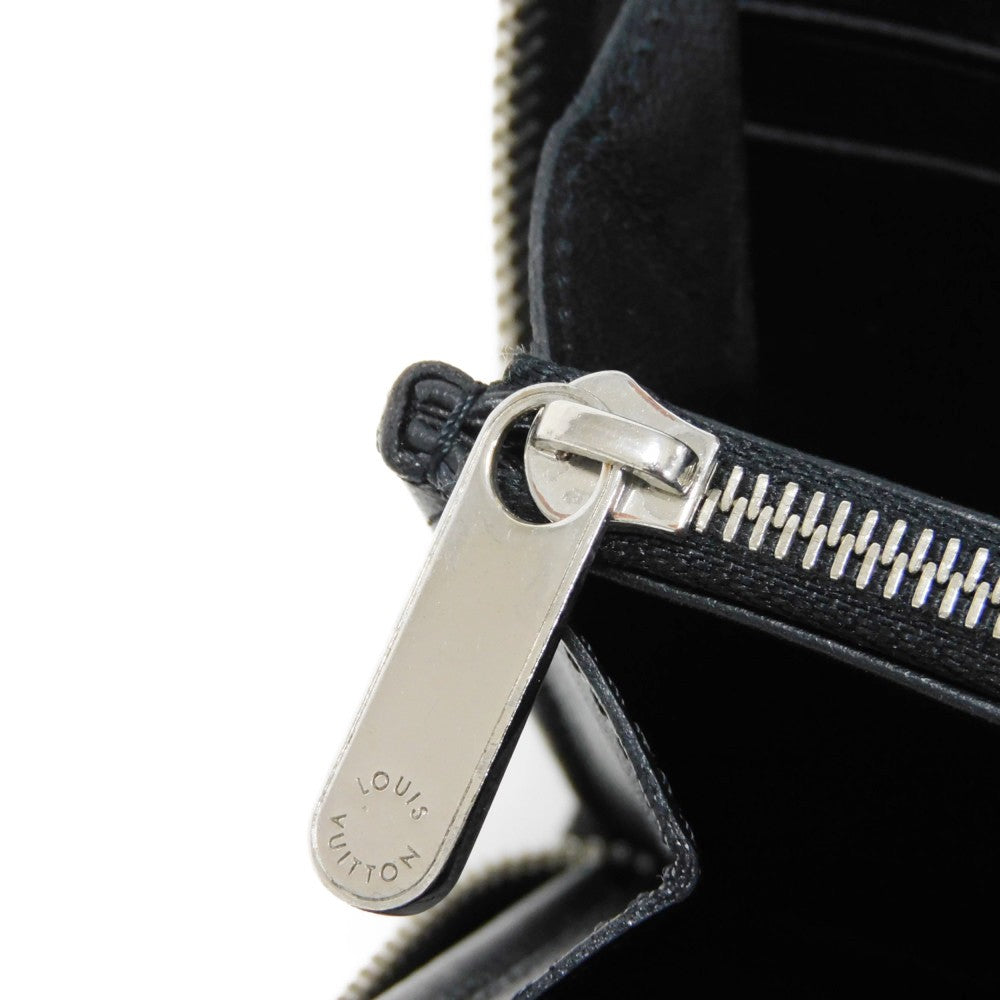 LOUIS VUITTON Long Wallet Purse M61867 Mahina leather (stamped) Noir LV Logo Flower Perforation Punching Black Monogram Mahina Zippy wallet mens(Unisex) Used Authentic