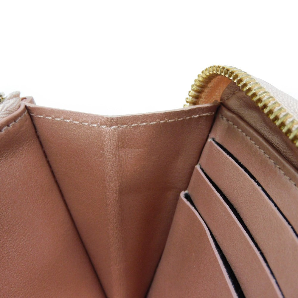 LOUIS VUITTON Long Wallet Purse M81708 Lamb leather (monogram type push) x calf leather Rose gold Monogram emboss Zippy wallet
