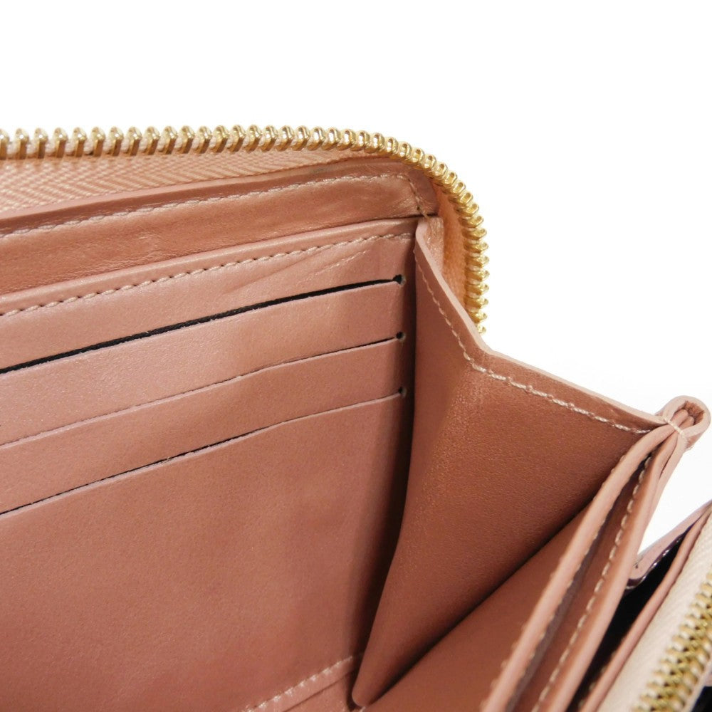LOUIS VUITTON Long Wallet Purse M81708 Lamb leather (monogram type push) x calf leather Rose gold Monogram emboss Zippy wallet