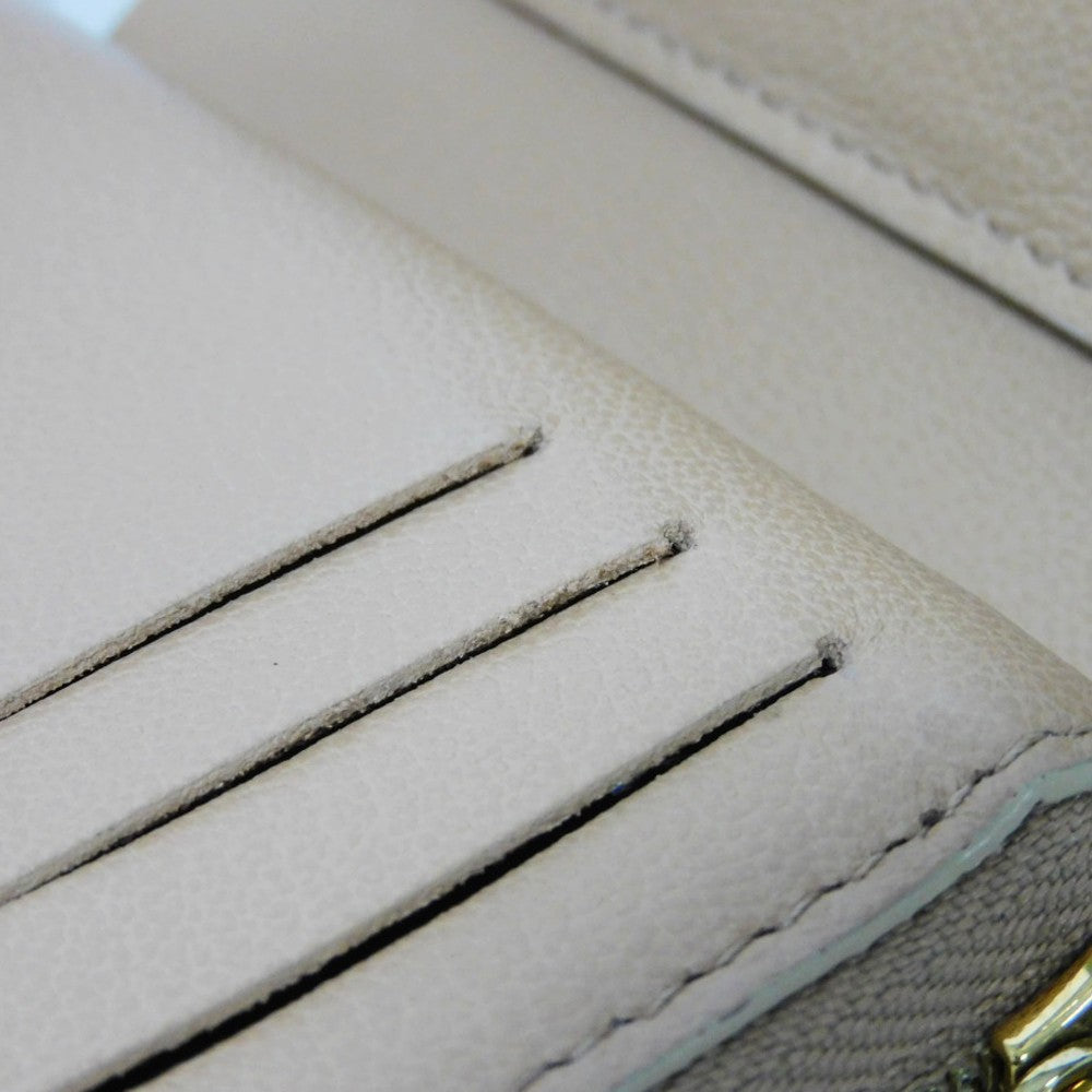 LOUIS VUITTON Bifold Wallet M81673 Lamb leather (monogram type push) x calf leather Camel Current LV logo flower beige RFID IC chip Monogram emboss Portefeuille Lou unisex(Unisex) Used Authentic