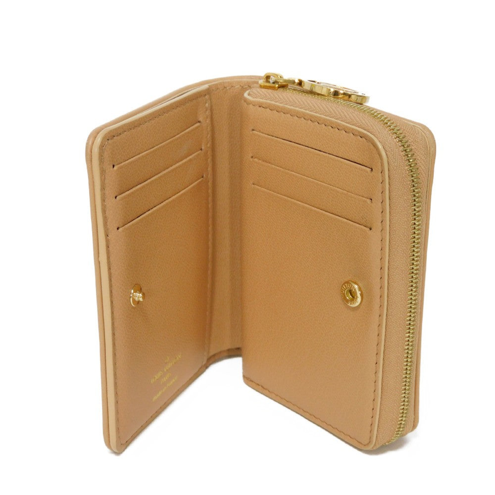 LOUIS VUITTON Bifold Wallet M81673 Lamb leather (monogram type push) x calf leather Camel Current LV logo flower beige RFID IC chip Monogram emboss Portefeuille Lou unisex(Unisex) Used Authentic