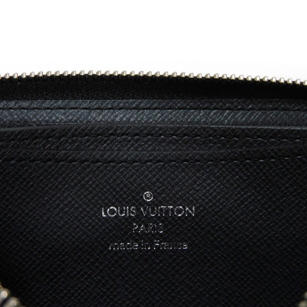 LOUIS VUITTON Coin case M32832 Taiga leather (embossed) Aldoise LV logo embossed charcoal grey old style Zip Around Taiga Zip Around Purse mens Used Authentic
