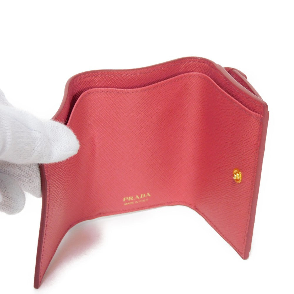 PRADA Tri-fold wallet 1MH021 QWA F0505 Safiano leather (stamped) Peonia Pink RFID logo metal Saffiano Mini Wallet Women Used Authentic