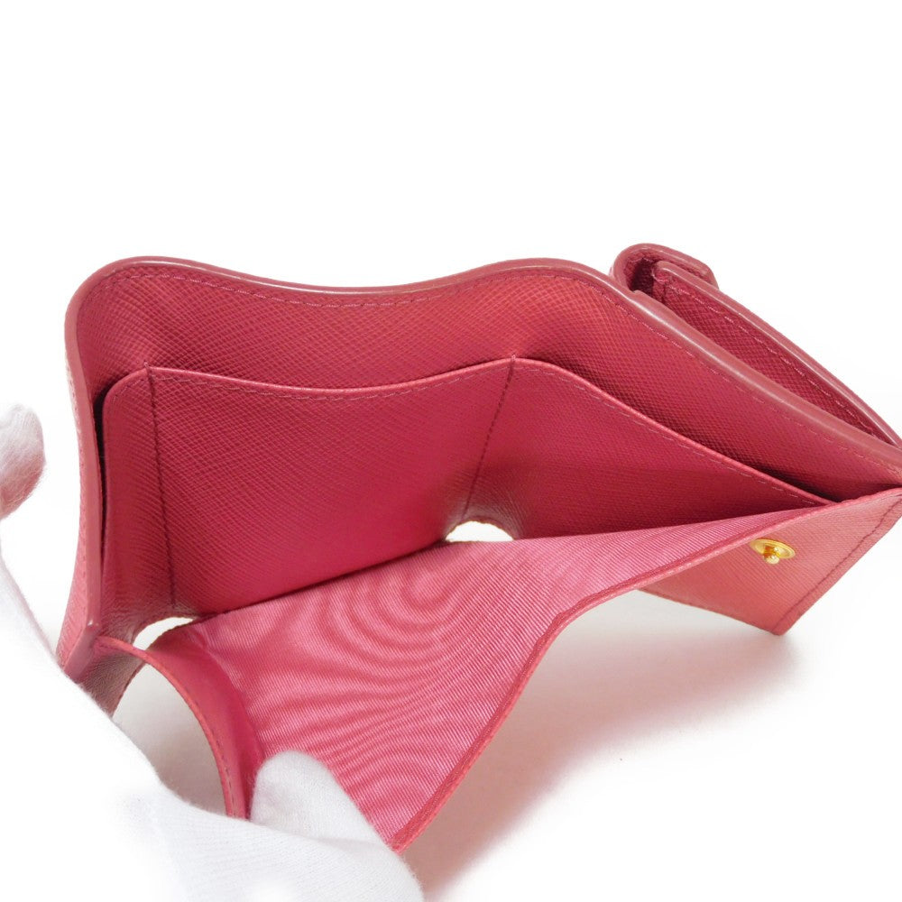 PRADA Tri-fold wallet 1MH021 QWA F0505 Safiano leather (stamped) Peonia Pink RFID logo metal Saffiano Mini Wallet Women Used Authentic