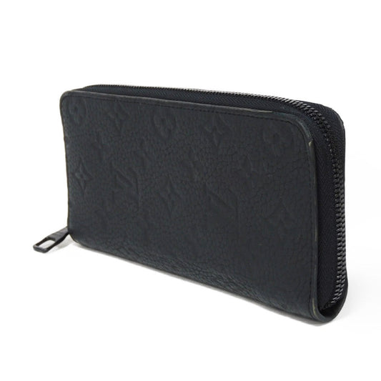 LOUIS VUITTON Long Wallet Purse M69047 Taurillon Clemence leather (monogram embossed) black New Zip Around Current Monogram Zippy Wallet Vertical mens Used Authentic