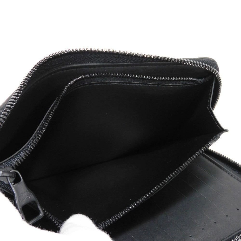 LOUIS VUITTON Long Wallet Purse M69047 Taurillon Clemence leather (monogram embossed) black New Zip Around Current Monogram Zippy Wallet Vertical mens Used Authentic