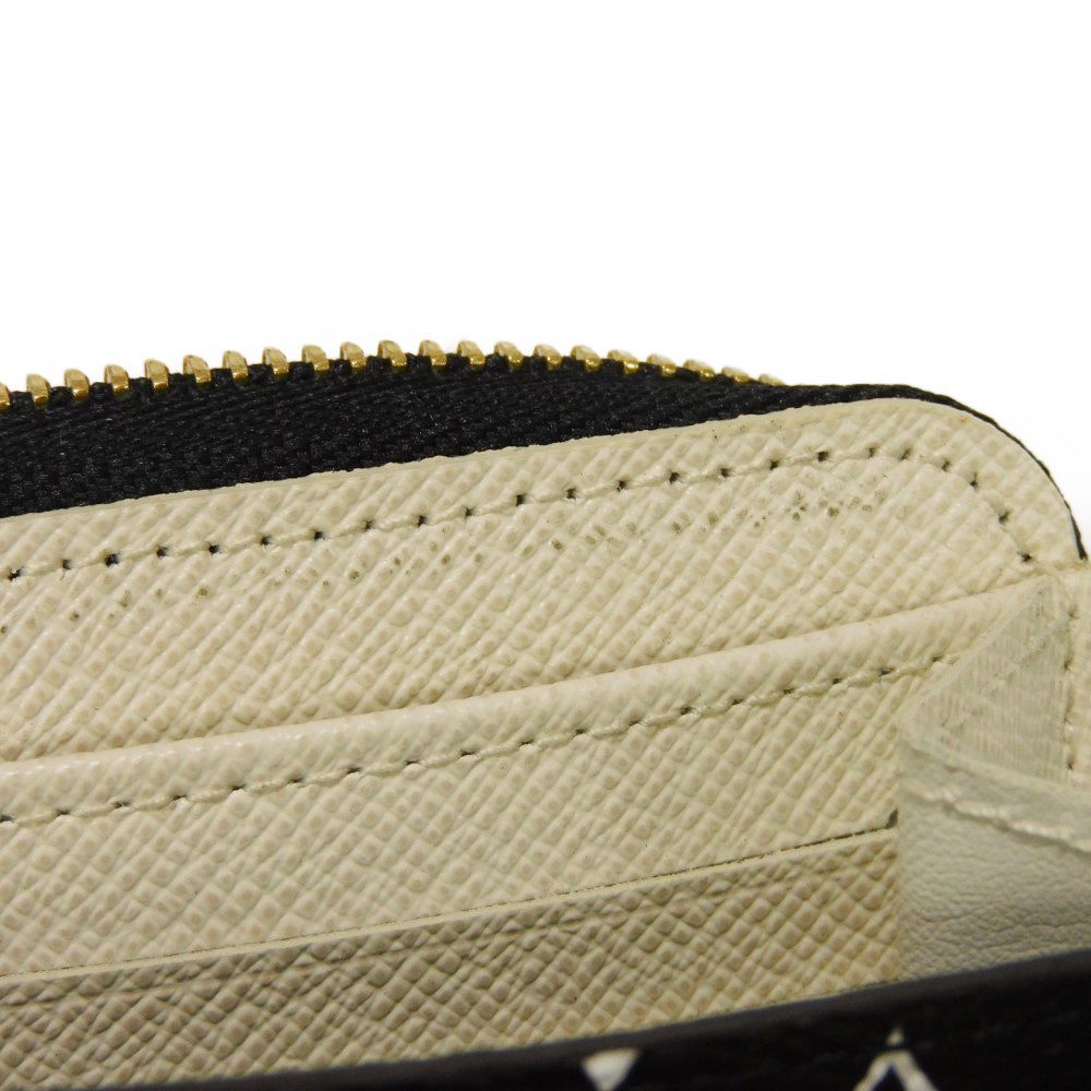 LOUIS VUITTON Coin case M67879 Monogram Giant Canvas (Animal Print) x Grain Leather Ivory Monogram Giant LV Jungle Animal Zip around purse