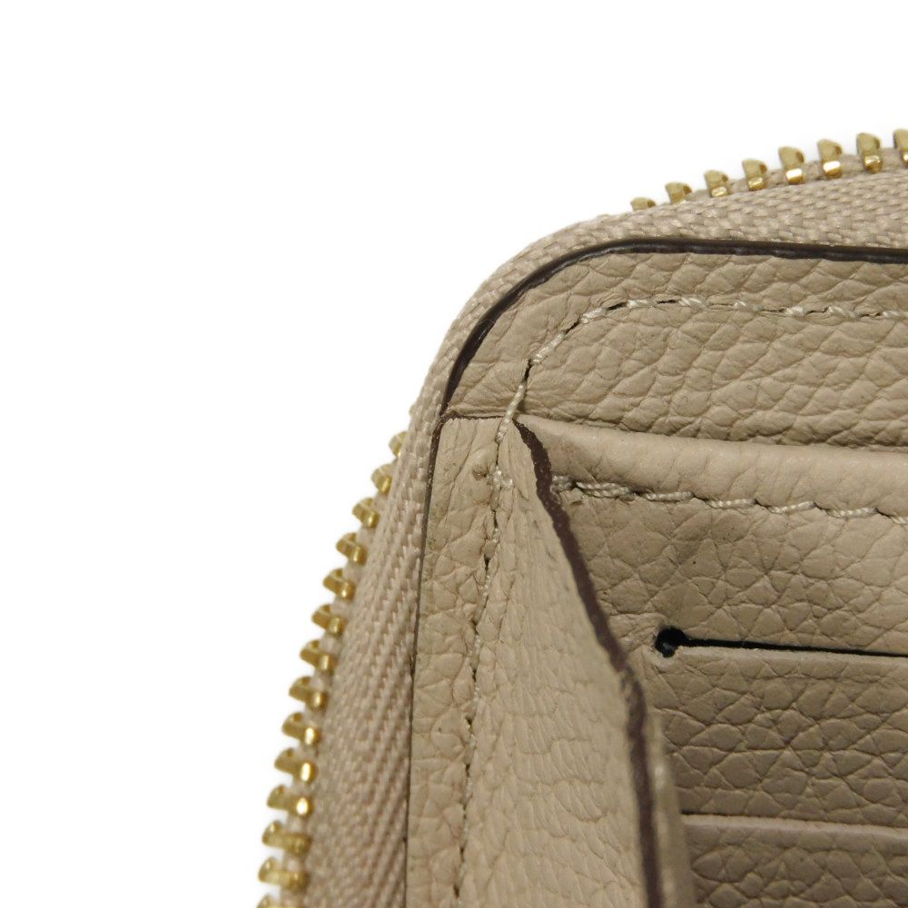 LOUIS VUITTON Coin case M80100 Grain calf leather (embossed) Gurege LV signature Lock me Zip around purse