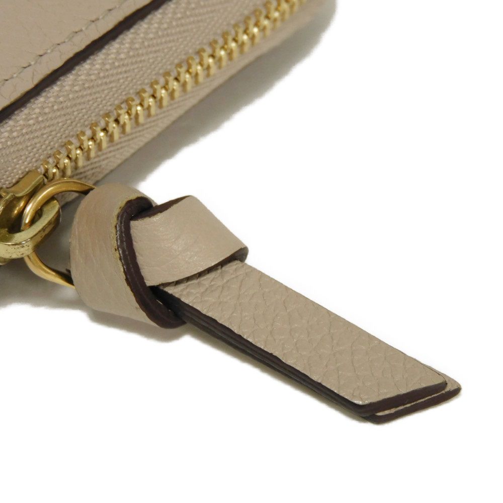 LOUIS VUITTON Coin case M80100 Grain calf leather (embossed) Gurege LV signature Lock me Zip around purse