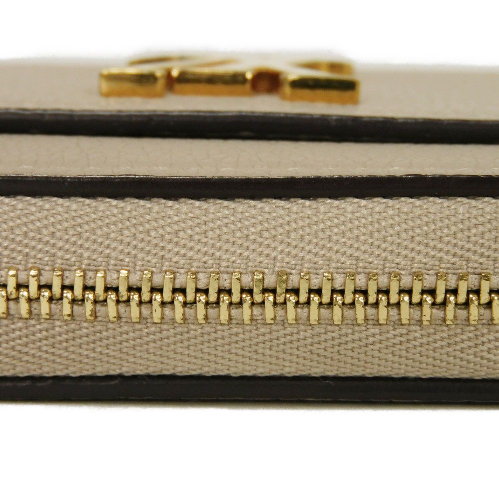 LOUIS VUITTON Coin case M80100 Grain calf leather (embossed) Gurege LV signature Lock me Zip around purse