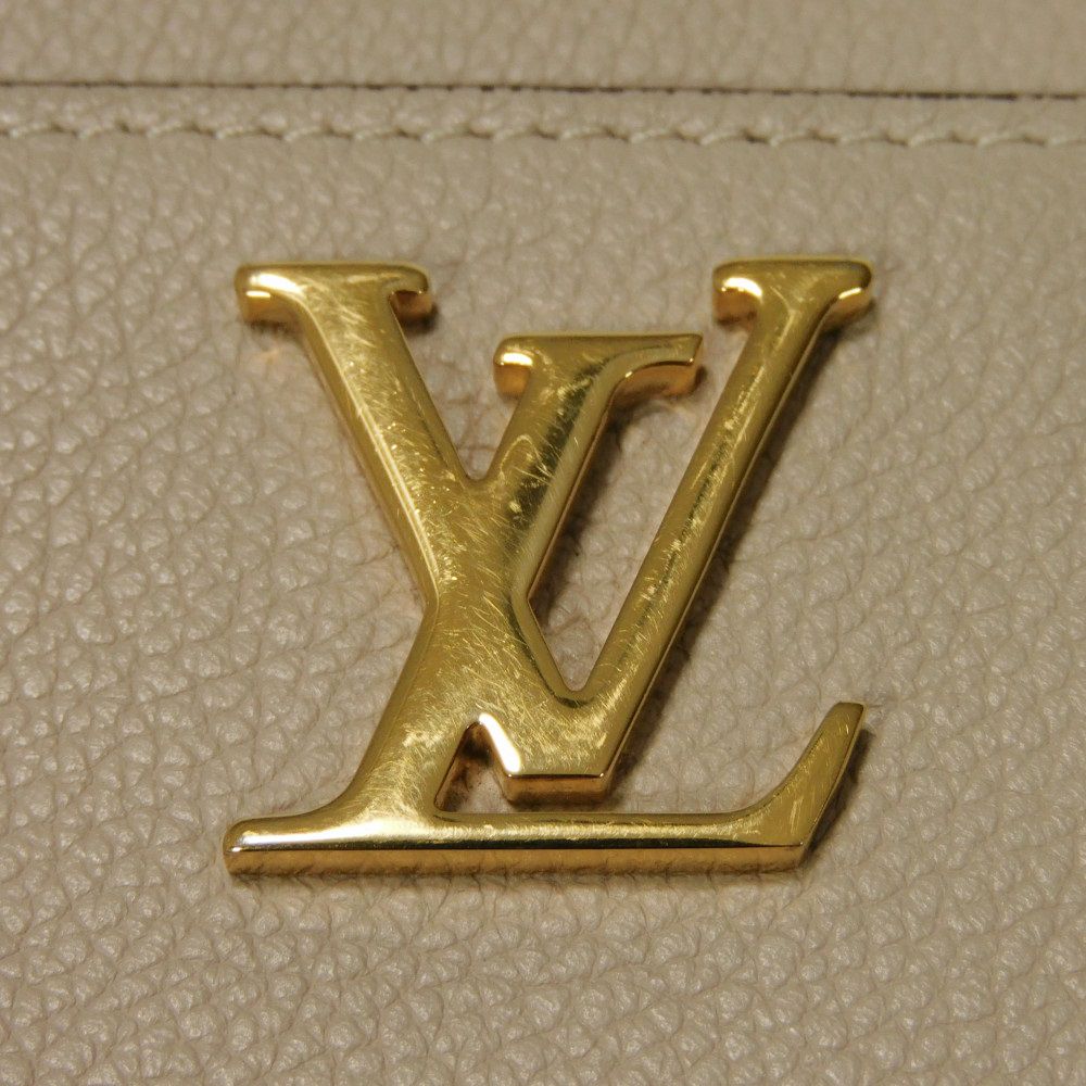 LOUIS VUITTON Coin case M80100 Grain calf leather (embossed) Gurege LV signature Lock me Zip around purse