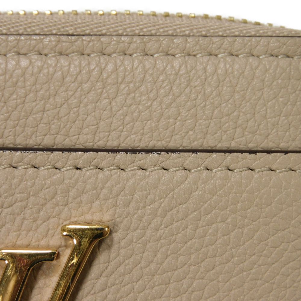 LOUIS VUITTON Coin case M80100 Grain calf leather (embossed) Gurege LV signature Lock me Zip around purse