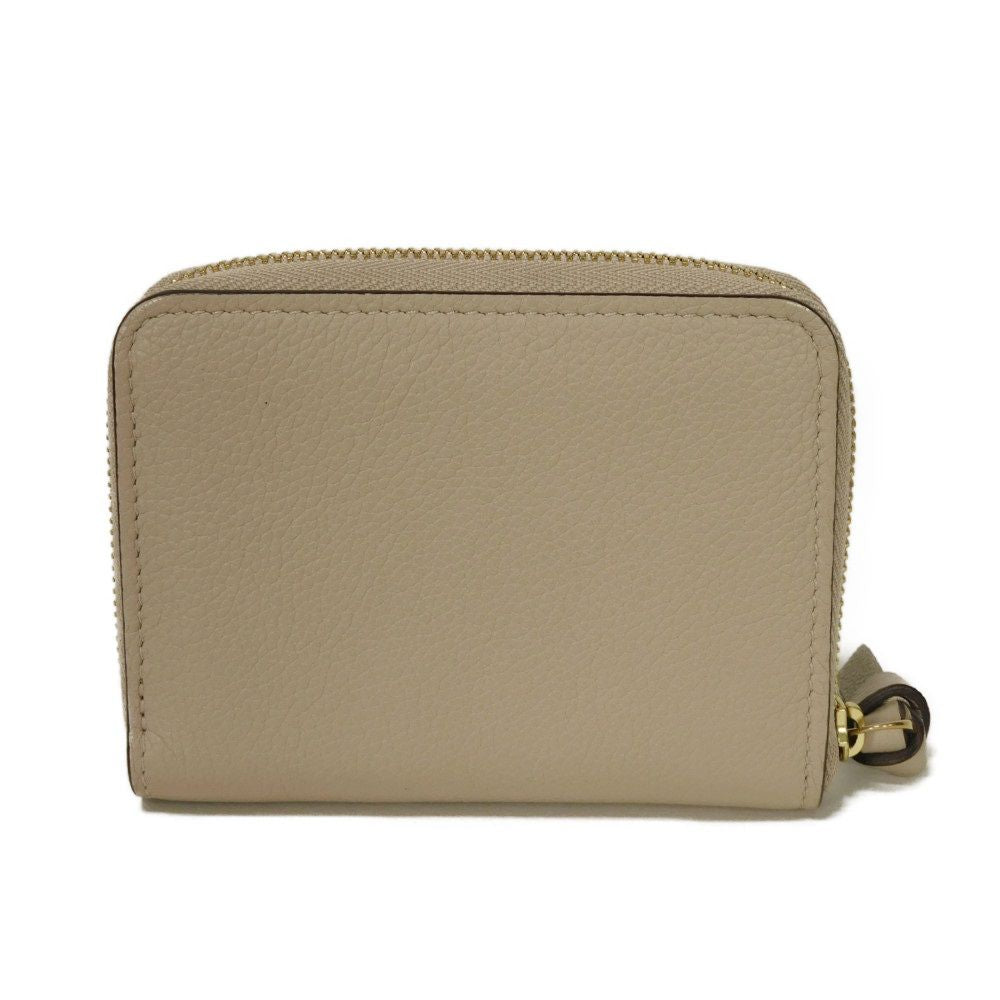 LOUIS VUITTON Coin case M80100 Grain calf leather (embossed) Gurege LV signature Lock me Zip around purse