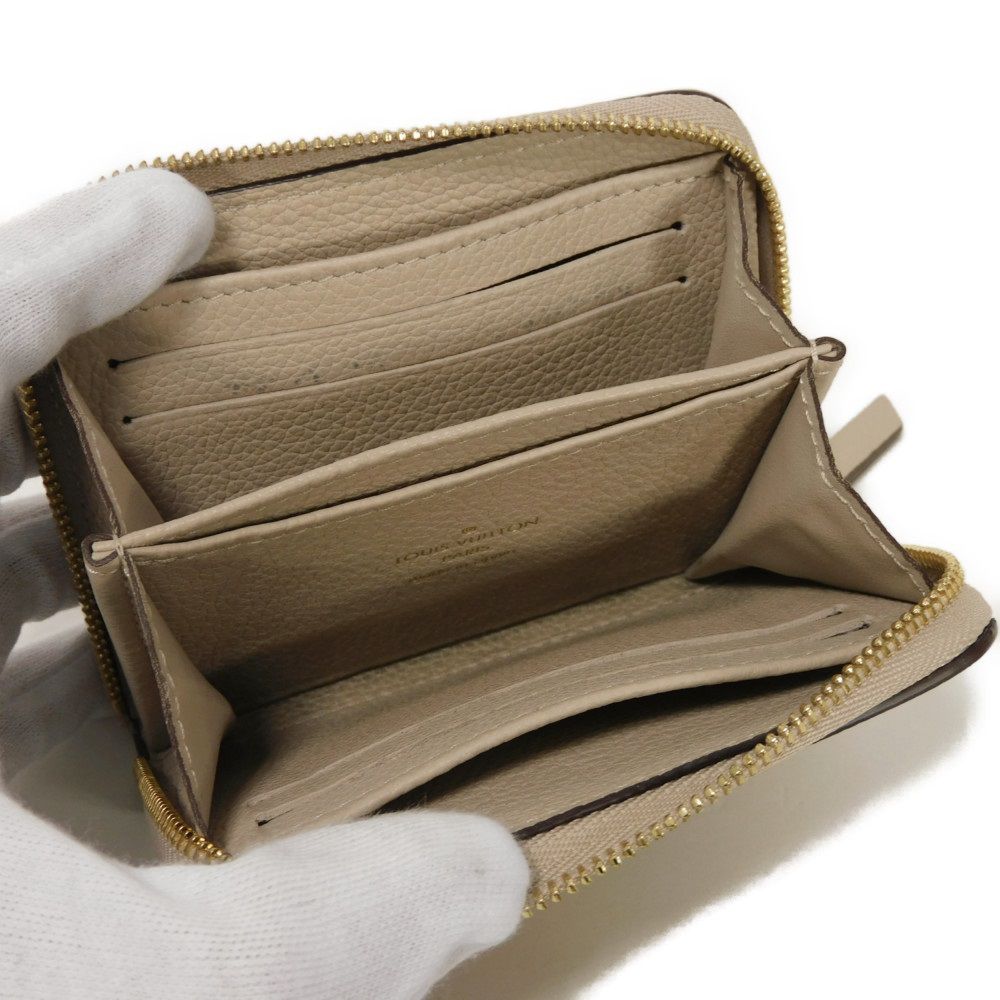 LOUIS VUITTON Coin case M80100 Grain calf leather (embossed) Gurege LV signature Lock me Zip around purse
