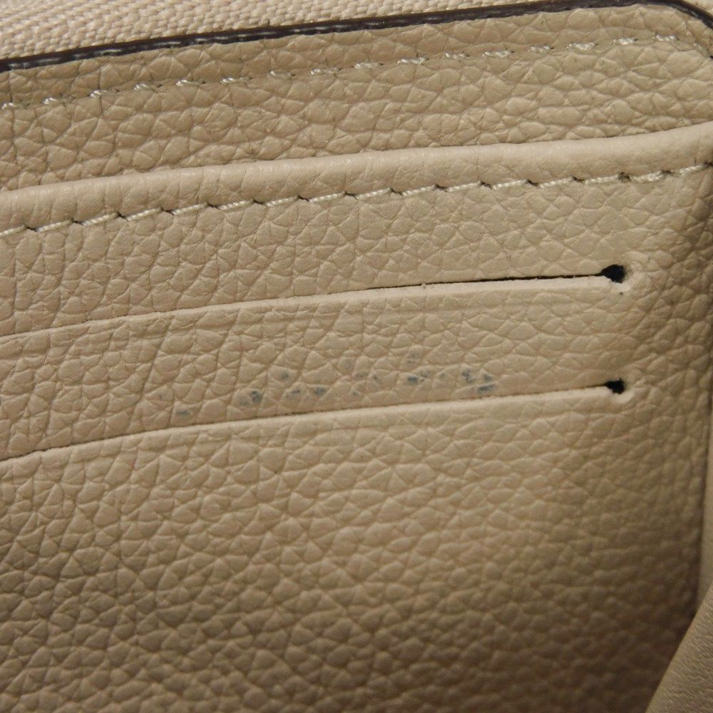 LOUIS VUITTON Coin case M80100 Grain calf leather (embossed) Gurege LV signature Lock me Zip around purse