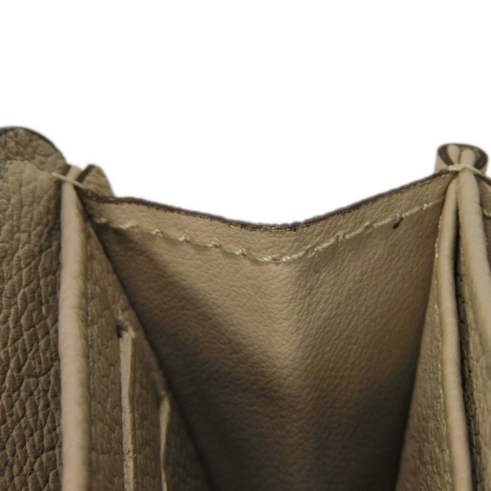 LOUIS VUITTON Coin case M80100 Grain calf leather (embossed) Gurege LV signature Lock me Zip around purse