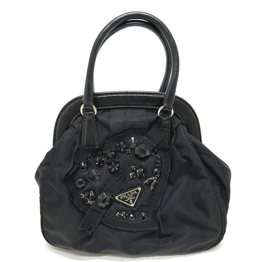 PRADA Handbag Nylon / leather black Evening bear