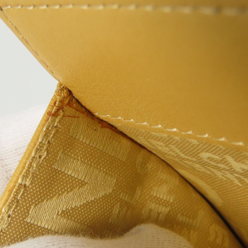 CHANEL Bifold Wallet lambskin beige icon