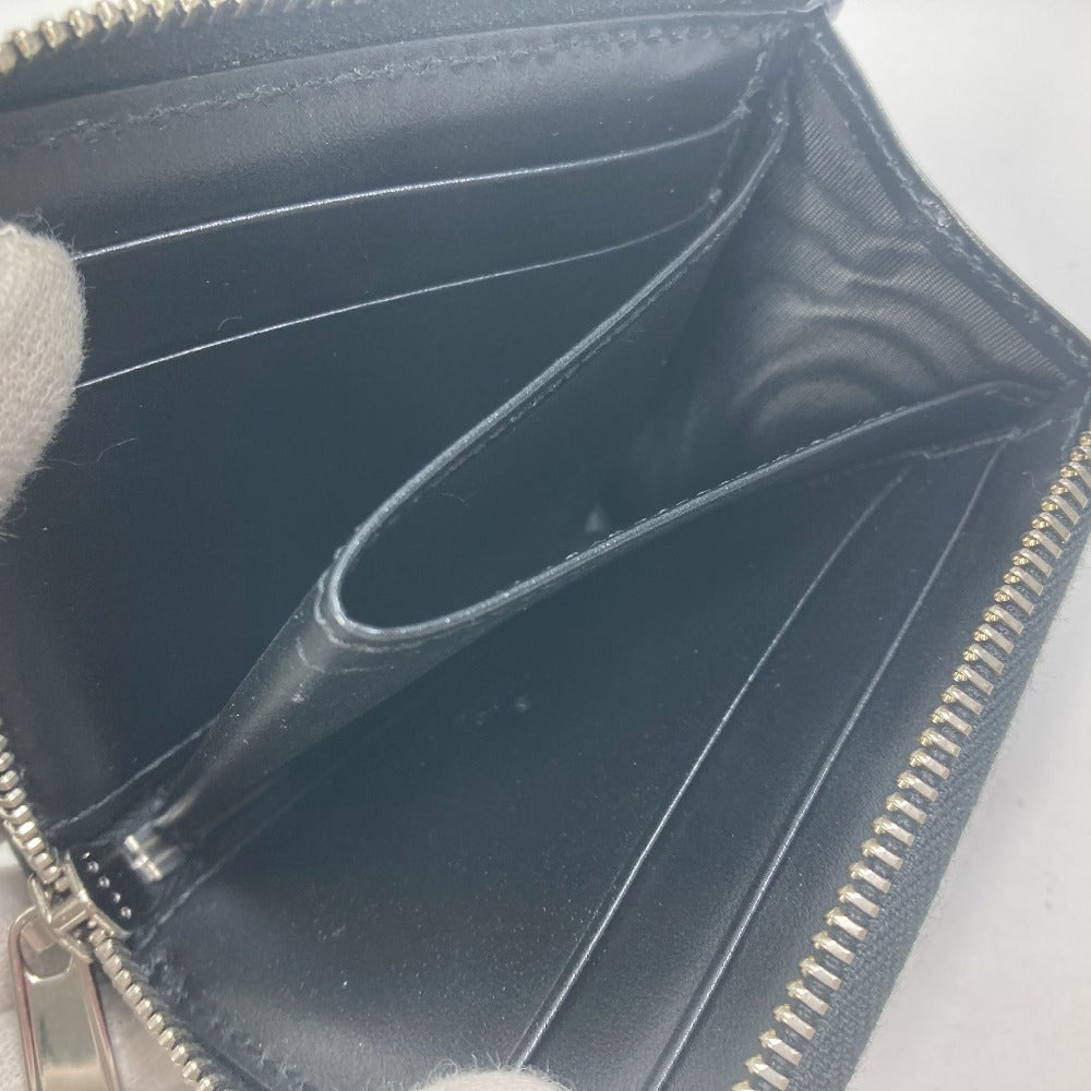 GUCCI Coin case 657571 leather black GG emboss L-shaped fastener mens Used Authentic