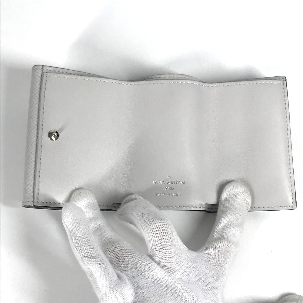 LOUIS VUITTON Trifold wallet M67621 Taiga Leather, Monogram Canvas white Taigalama Discovery compact wallet