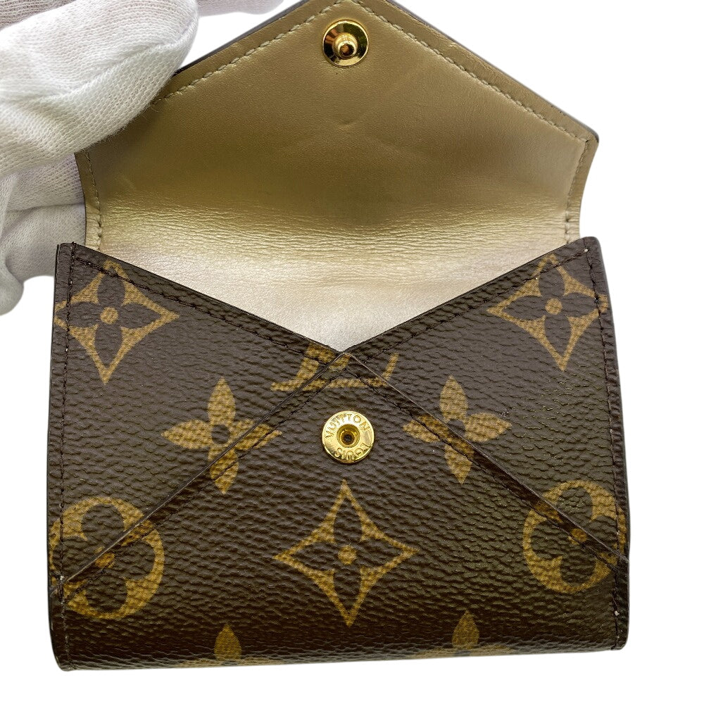 LOUIS VUITTON Tri-fold wallet M81667 leather Brown Portefeuille Monogram Celest Women Used Authentic