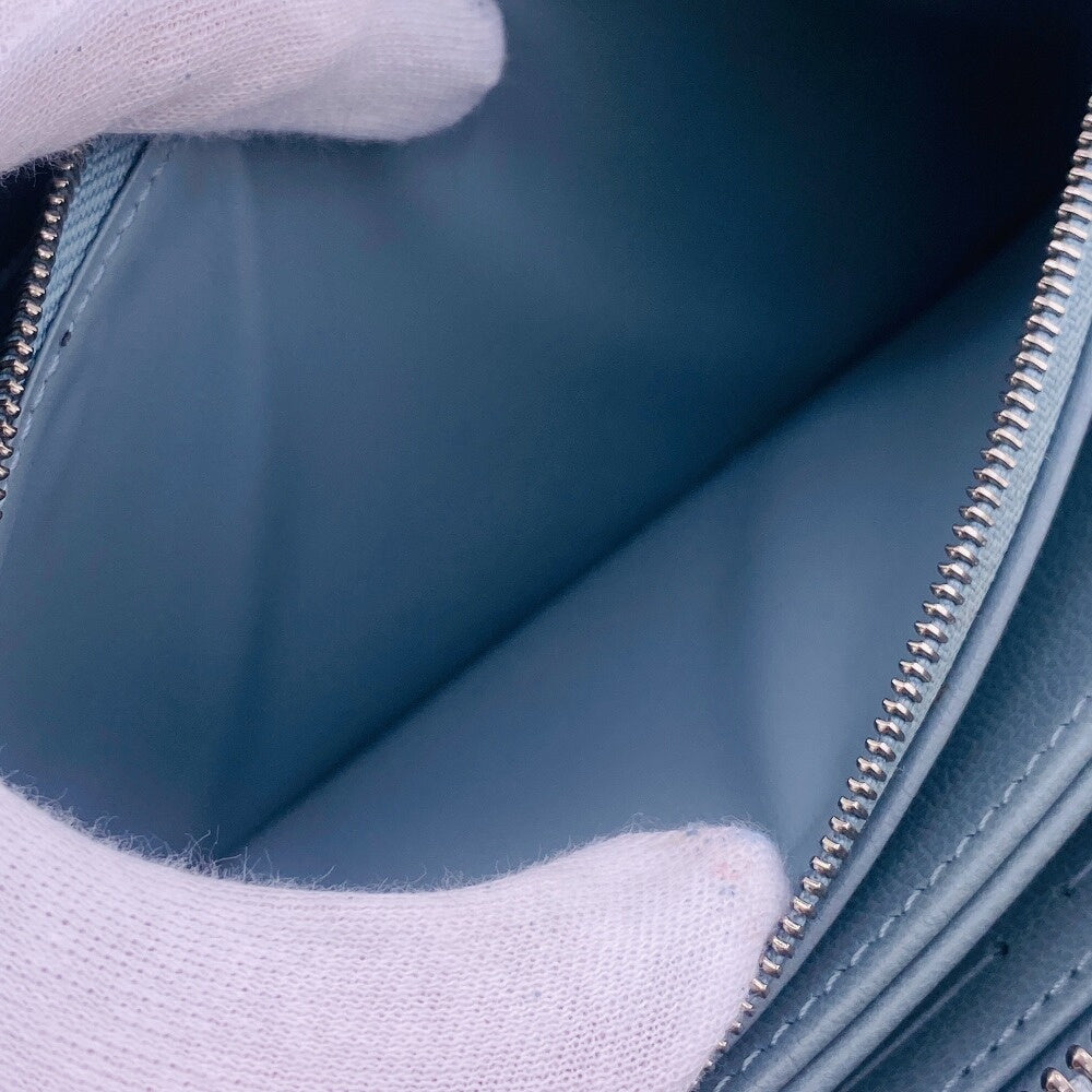 LOUIS VUITTON Long Wallet Purse M83682 leather blue Zip Around Monogram embossed Coussin Zippy wallet Women Used Authentic