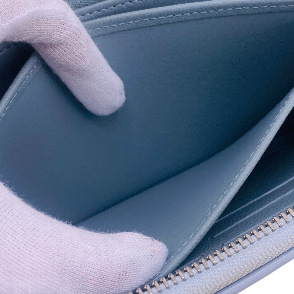 LOUIS VUITTON Long Wallet Purse M83682 leather blue Zip Around Monogram embossed Coussin Zippy wallet Women Used Authentic