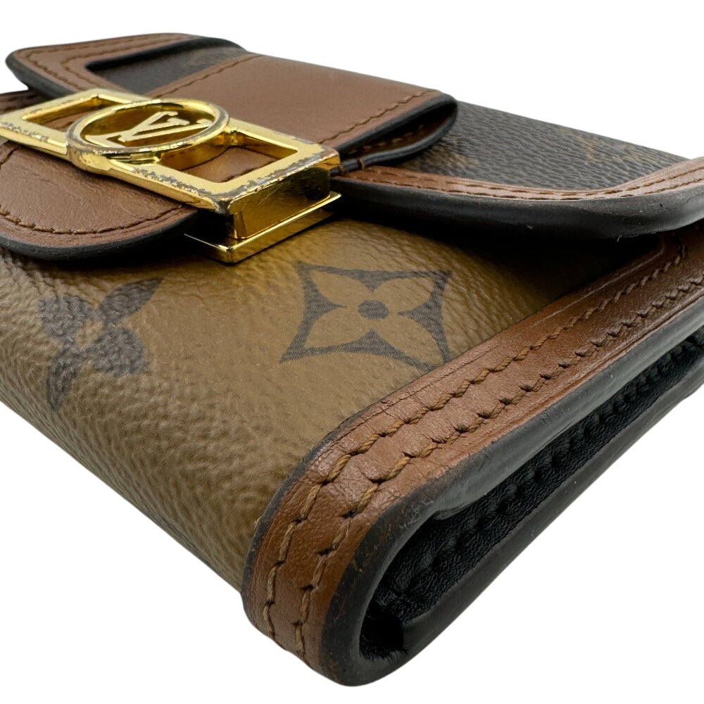 LOUIS VUITTON Tri-fold wallet M68725 leather Brown Monogram reverse Portefeuille Daufine Compact