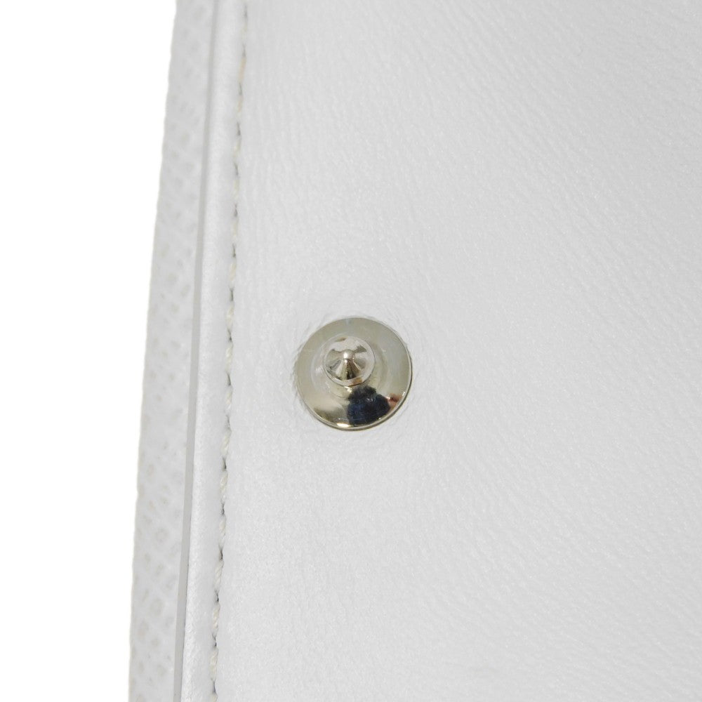 LOUIS VUITTON Tri-fold wallet M67621 Taiga leather x monogram canvas x smooth leather Bron LV Logo Flower White Monogram Discovery compact wallet mens Used Authentic