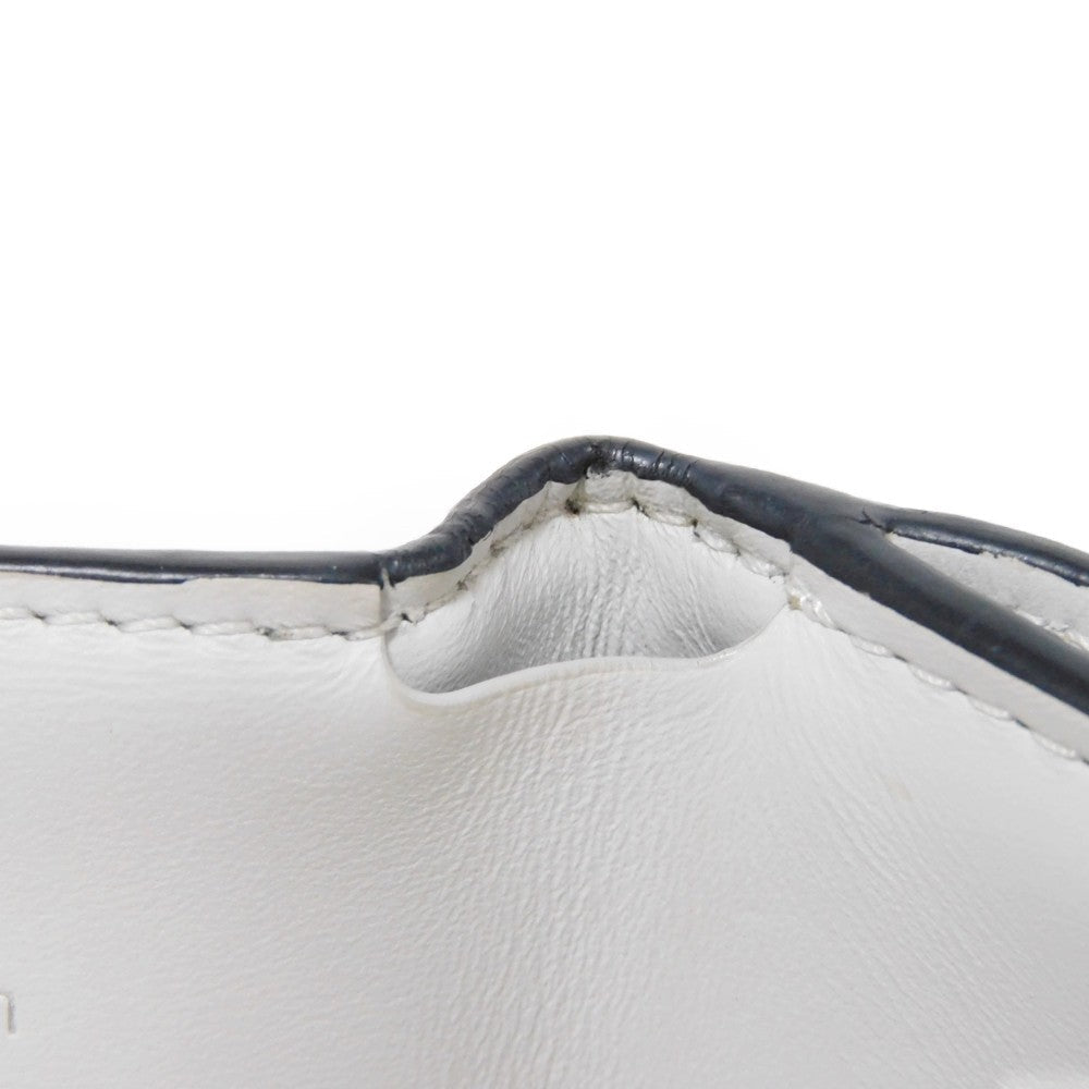 LOUIS VUITTON Tri-fold wallet M67621 Taiga leather x monogram canvas x smooth leather Bron LV Logo Flower White Monogram Discovery compact wallet mens Used Authentic