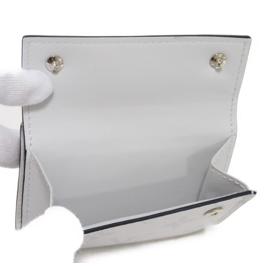 LOUIS VUITTON Tri-fold wallet M67621 Taiga leather x monogram canvas x smooth leather Bron LV Logo Flower White Monogram Discovery compact wallet mens Used Authentic