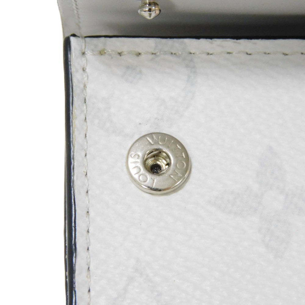 LOUIS VUITTON Tri-fold wallet M67621 Taiga leather x monogram canvas x smooth leather Bron LV Logo Flower White Monogram Discovery compact wallet mens Used Authentic