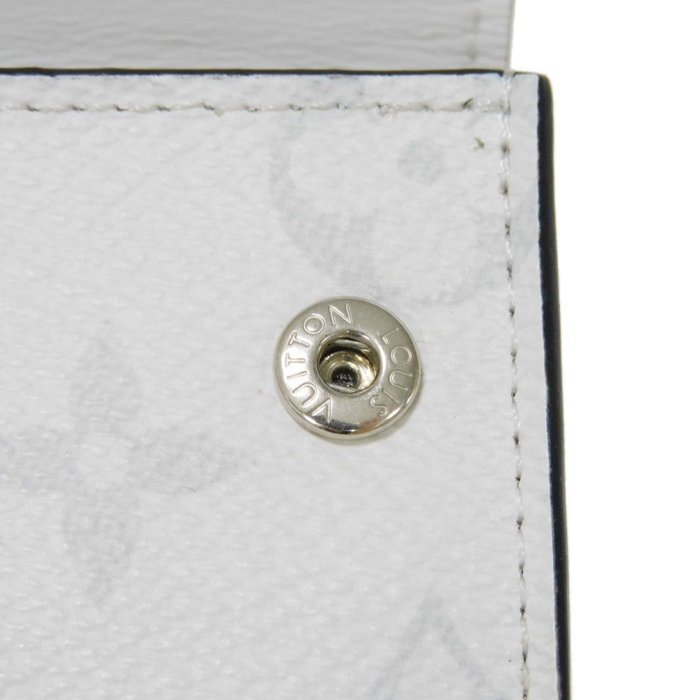 LOUIS VUITTON Tri-fold wallet M67621 Taiga leather x monogram canvas x smooth leather Bron LV Logo Flower White Monogram Discovery compact wallet mens Used Authentic