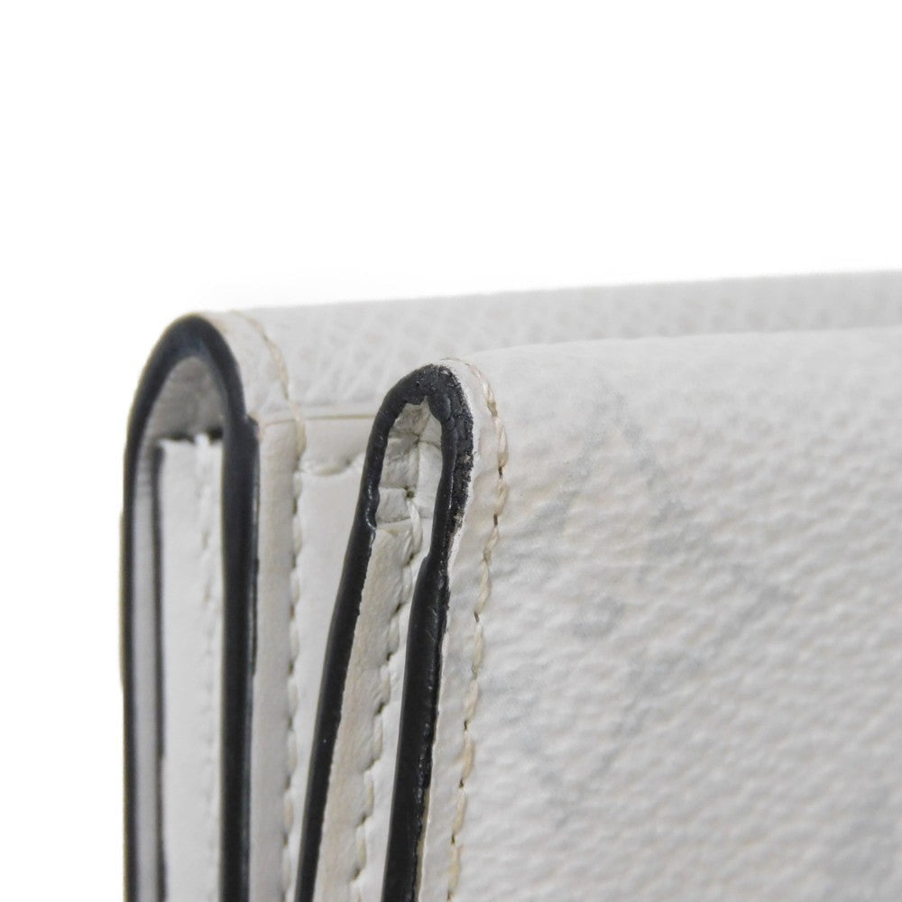 LOUIS VUITTON Tri-fold wallet M67621 Taiga leather x monogram canvas x smooth leather Bron LV Logo Flower White Monogram Discovery compact wallet mens Used Authentic