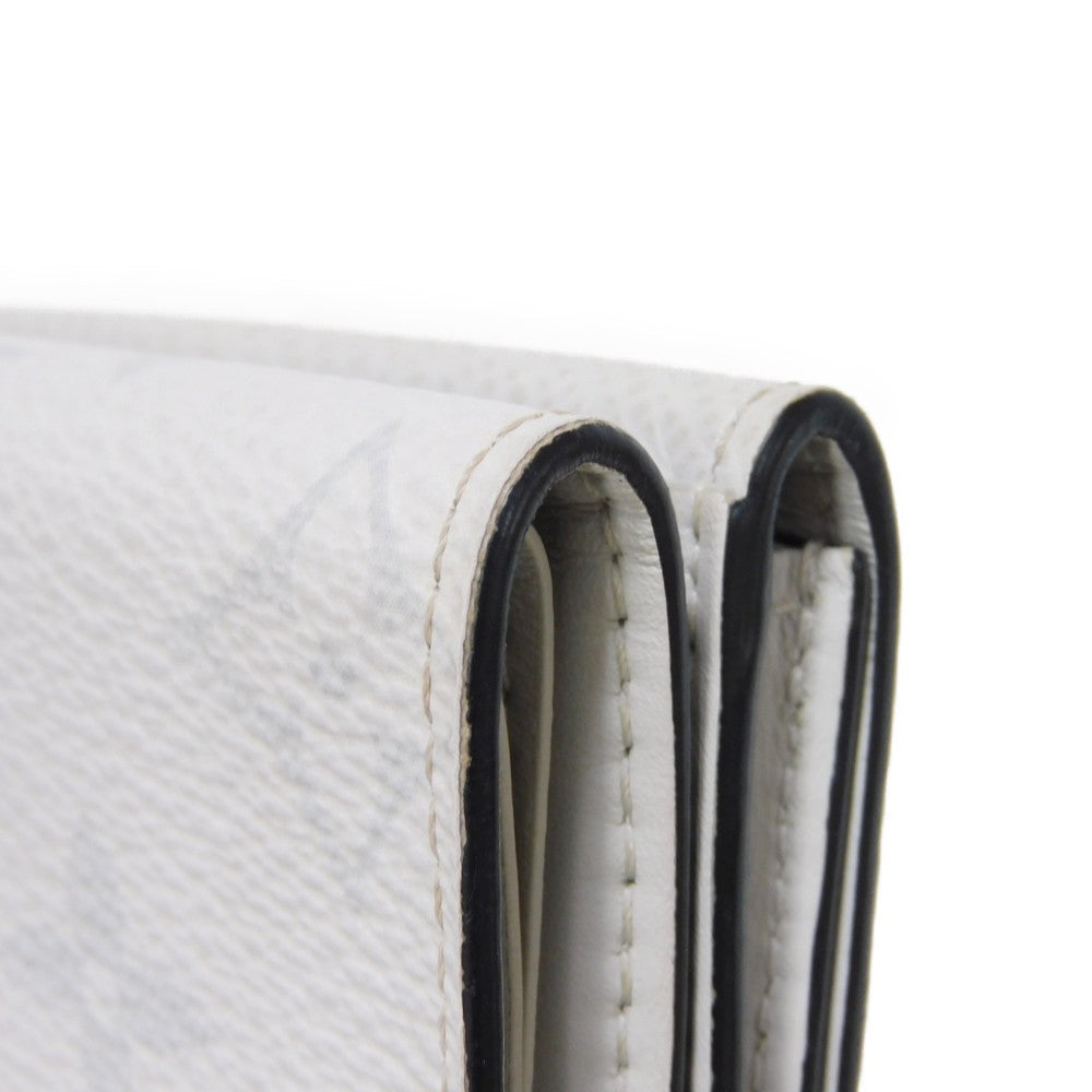 LOUIS VUITTON Tri-fold wallet M67621 Taiga leather x monogram canvas x smooth leather Bron LV Logo Flower White Monogram Discovery compact wallet mens Used Authentic