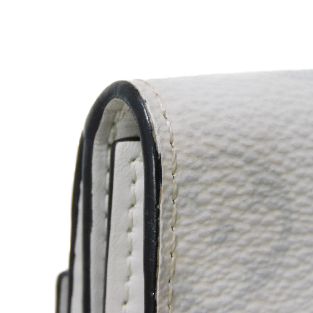 LOUIS VUITTON Tri-fold wallet M67621 Taiga leather x monogram canvas x smooth leather Bron LV Logo Flower White Monogram Discovery compact wallet mens Used Authentic