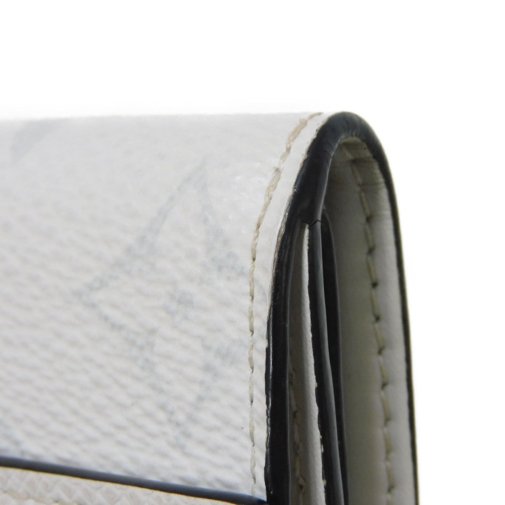 LOUIS VUITTON Tri-fold wallet M67621 Taiga leather x monogram canvas x smooth leather Bron LV Logo Flower White Monogram Discovery compact wallet mens Used Authentic