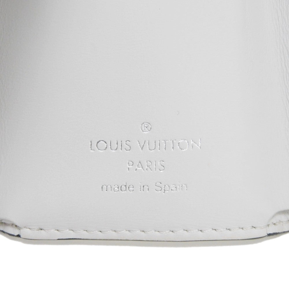 LOUIS VUITTON Tri-fold wallet M67621 Taiga leather x monogram canvas x smooth leather Bron LV Logo Flower White Monogram Discovery compact wallet mens Used Authentic