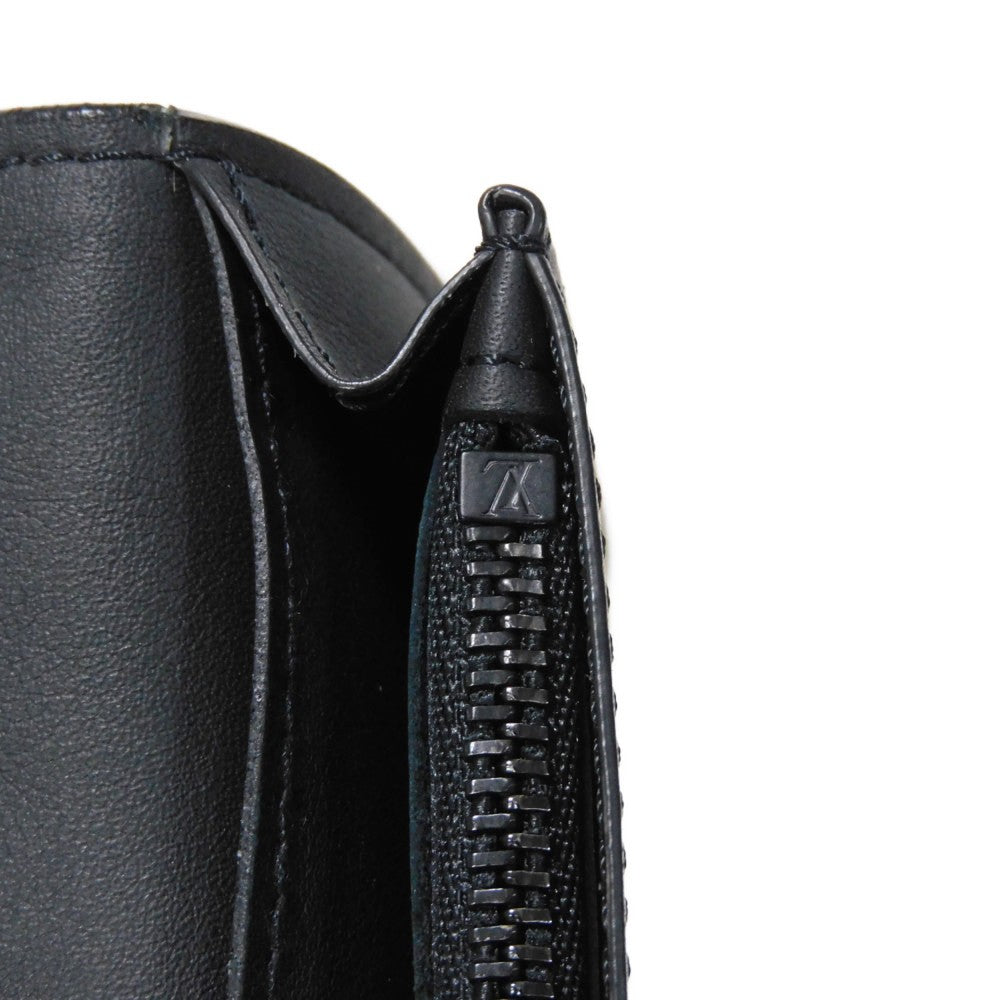 LOUIS VUITTON Long Wallet Purse M69038 Taurillon Clemence leather (monogram embossed) Noir New Bifold Wallet Long Wallet Purse Black Current RFID IC Chip Monogram Taurillon Clemence Portefeuille Braza mens Used Authentic