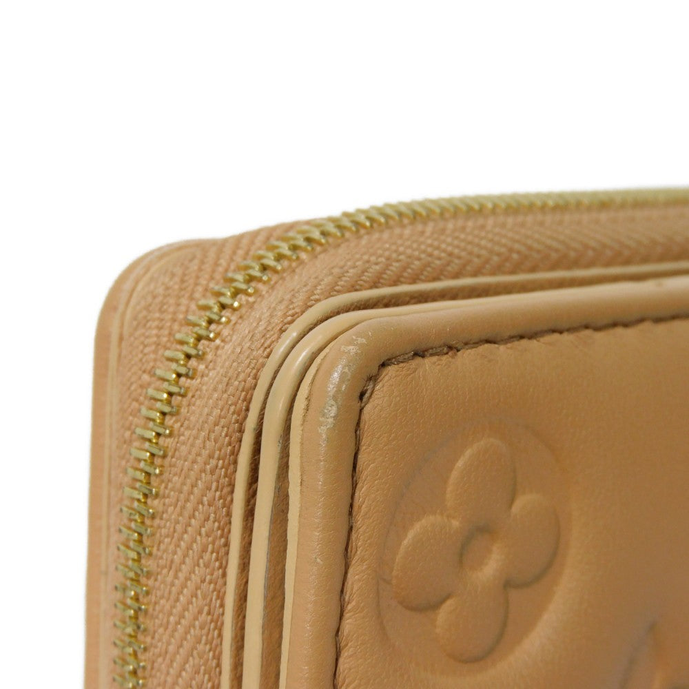 LOUIS VUITTON Bifold Wallet M81673 Lamb leather (monogram type push) x calf leather Camel Current LV logo flower beige RFID IC chip Monogram emboss Portefeuille Lou unisex(Unisex) Used Authentic