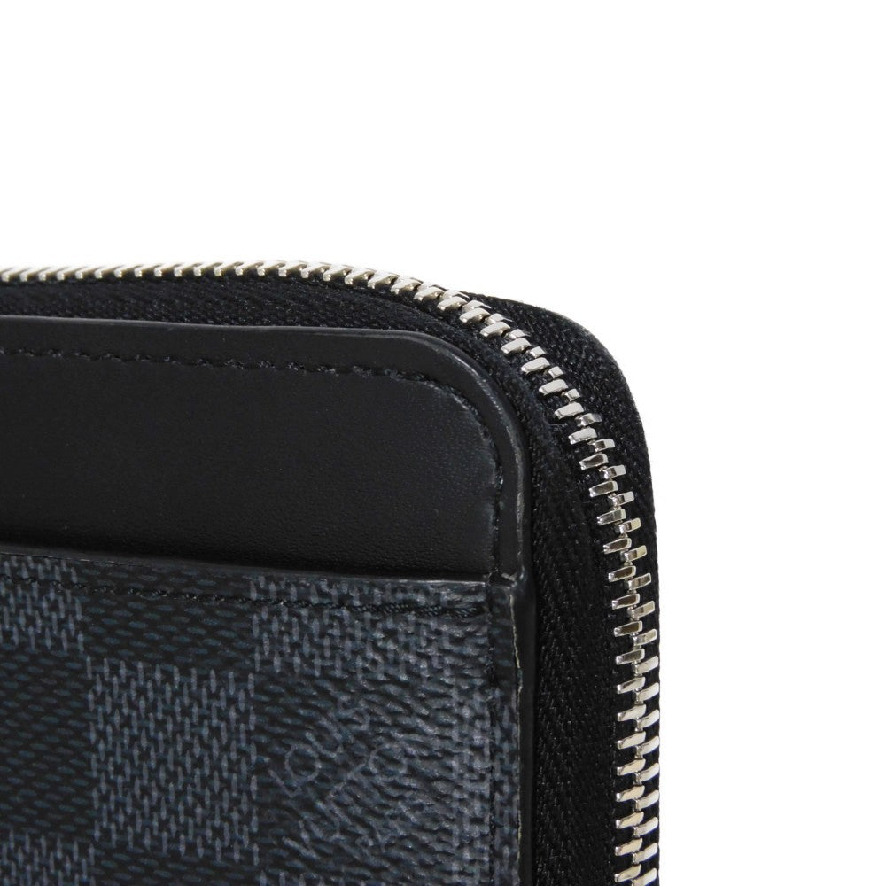 LOUIS VUITTON Long Wallet Purse N60379 Damier Graphite canvas x cowhide leather Noir Logo embossed L-shaped zipper Strap RFID IC chip Damier Graphite Zippy dragonne mens Used Authentic
