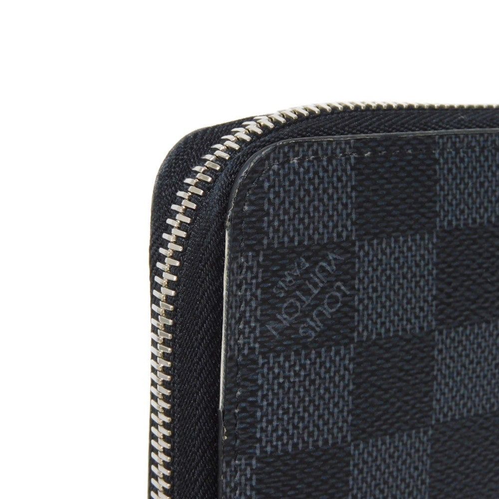 LOUIS VUITTON Long Wallet Purse N60379 Damier Graphite canvas x cowhide leather Noir Logo embossed L-shaped zipper Strap RFID IC chip Damier Graphite Zippy dragonne mens Used Authentic