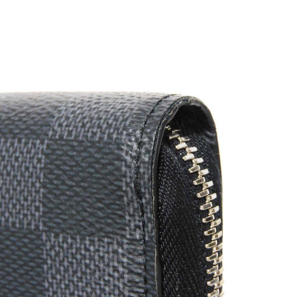 LOUIS VUITTON Long Wallet Purse N60379 Damier Graphite canvas x cowhide leather Noir Logo embossed L-shaped zipper Strap RFID IC chip Damier Graphite Zippy dragonne mens Used Authentic