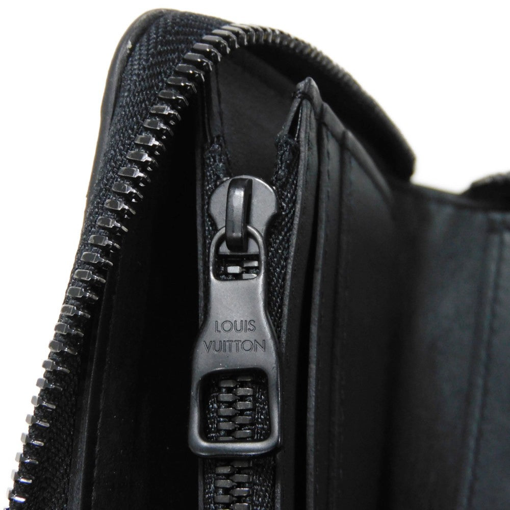 LOUIS VUITTON Long Wallet Purse M69047 Taurillon Clemence leather (monogram embossed) black New Zip Around Current Monogram Zippy Wallet Vertical mens Used Authentic