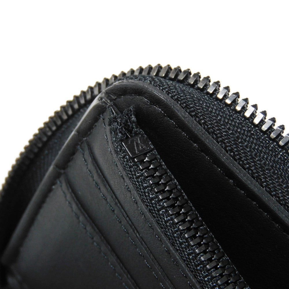 LOUIS VUITTON Long Wallet Purse M69047 Taurillon Clemence leather (monogram embossed) black New Zip Around Current Monogram Zippy Wallet Vertical mens Used Authentic