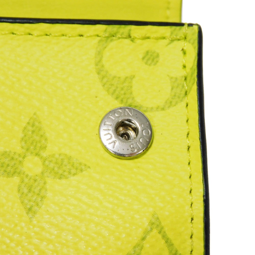LOUIS VUITTON Tri-fold wallet M67629 Taiga leather x monogram canvas x smooth leather Jonne LV Logo Flower Yellow Taiga Lama Monogram Discovery compact wallet mens Used Authentic