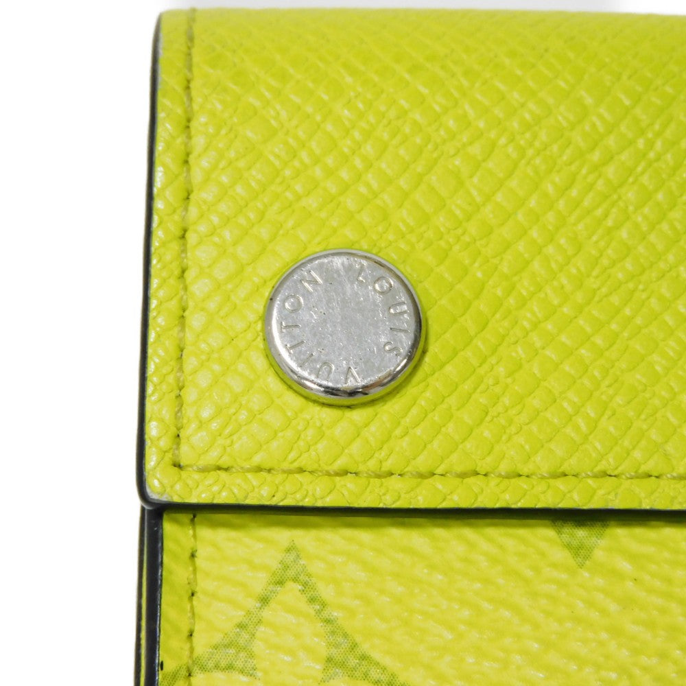 LOUIS VUITTON Tri-fold wallet M67629 Taiga leather x monogram canvas x smooth leather Jonne LV Logo Flower Yellow Taiga Lama Monogram Discovery compact wallet mens Used Authentic