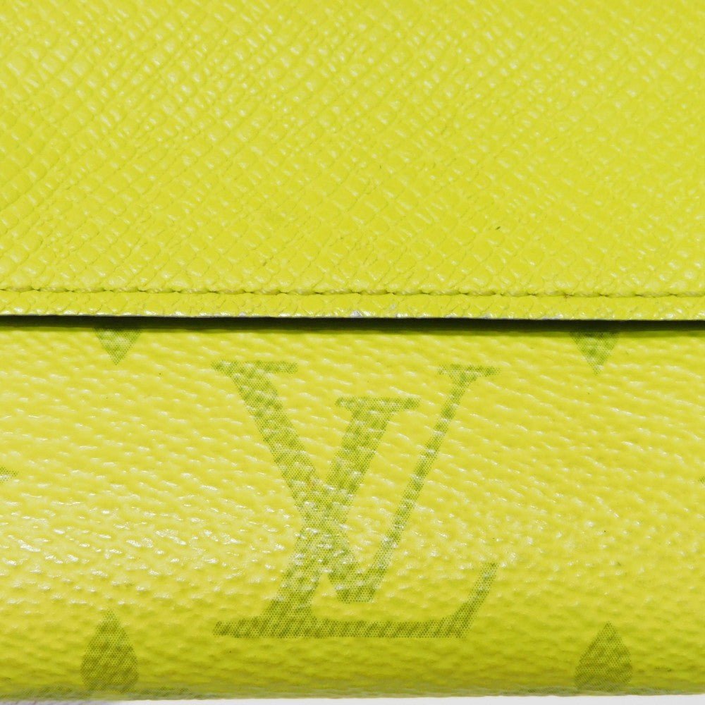 LOUIS VUITTON Tri-fold wallet M67629 Taiga leather x monogram canvas x smooth leather Jonne LV Logo Flower Yellow Taiga Lama Monogram Discovery compact wallet mens Used Authentic