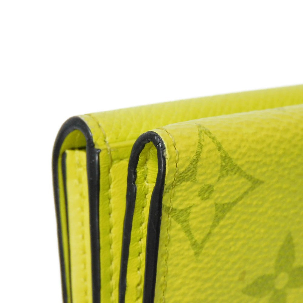 LOUIS VUITTON Tri-fold wallet M67629 Taiga leather x monogram canvas x smooth leather Jonne LV Logo Flower Yellow Taiga Lama Monogram Discovery compact wallet mens Used Authentic