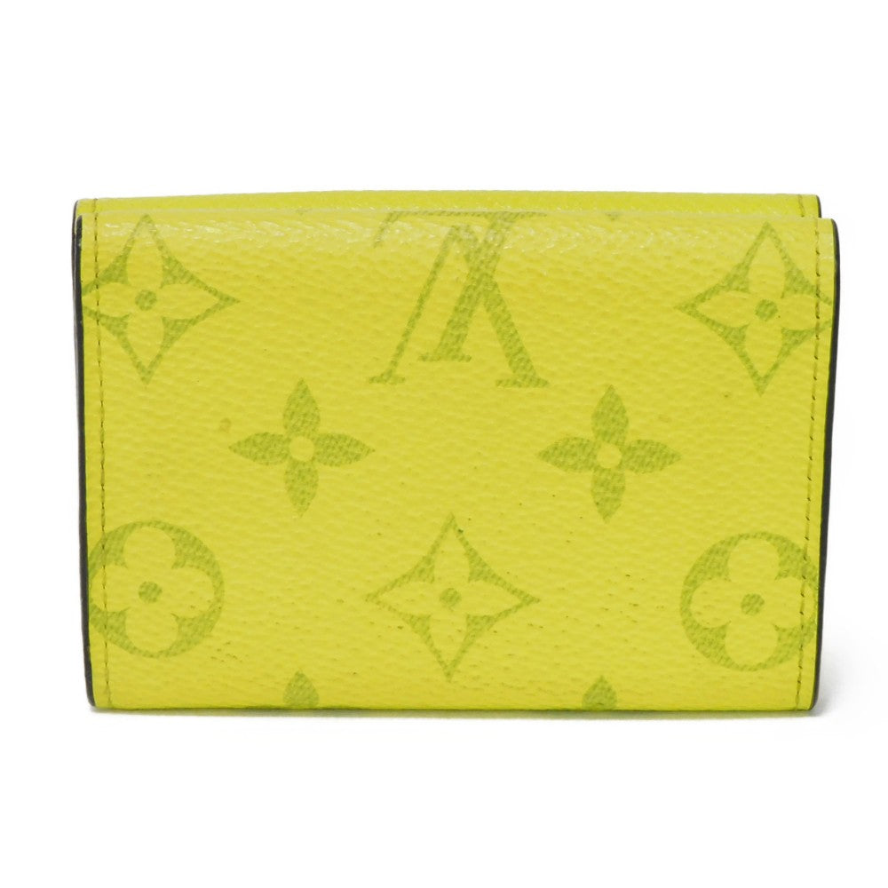 LOUIS VUITTON Tri-fold wallet M67629 Taiga leather x monogram canvas x smooth leather Jonne LV Logo Flower Yellow Taiga Lama Monogram Discovery compact wallet mens Used Authentic